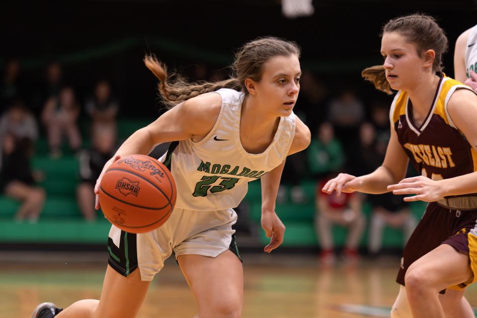 Mogadore's Ari Tompkins drives past a Southeast defender Wednesday night in Mogadore.