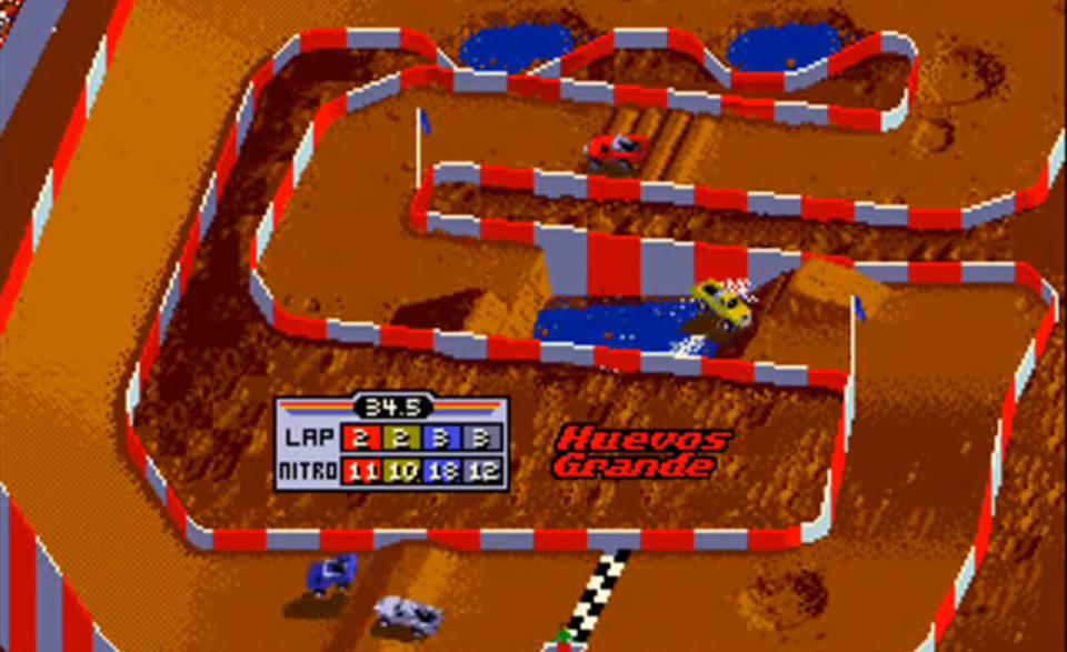 <p>Near as we can tell, Ivan “Ironman” Stewart’s Super Off Road may be the first driving game ever to feature modifiable vehicles. Released in 1989 as an arcade game-who didn't love standing there racing against your buddies?-Super Off Road was as addicting as it was fun. Players race against each other on a simply depicted stadium-style off-road course. As you progress through races, you win money you can use to give your truck increased capability via a speed boost, better tires, better shocks, better acceleration, and a higher top speed. The handful of track layouts all have nefarious obstacles to slow you down-don't hit the water!-and even the most minor mistake can send you to last place. Simple game, big fun, especially once it was ported to NES and later to Sega Genesis and SNES, and you could stop pumping quarters into a machine.</p>