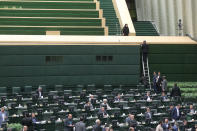 <p>Iranian lawmakers sit inside the parliament during an attack in central Tehran, Iran, June 7, 2017. (Photo: TIMA via Reuters) </p>