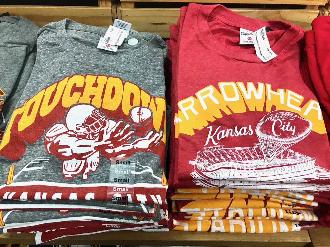 Charlie Hustle T-shirts sit on display in a Kansas City store.