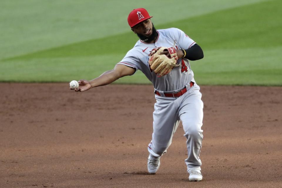 Angels second baseman Luis Rengifo throws to first base against the Seattle Mariners on Aug. 5.