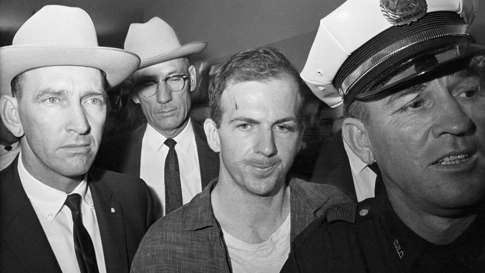 Lee Harvey Oswald is pictured after his arrest on 22 November