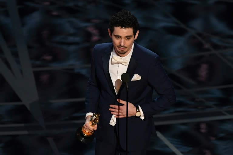 Director Damien Chazelle delivers a speech after he won the best director award for "La La Land" at the 89th Oscars on February 26, 2017