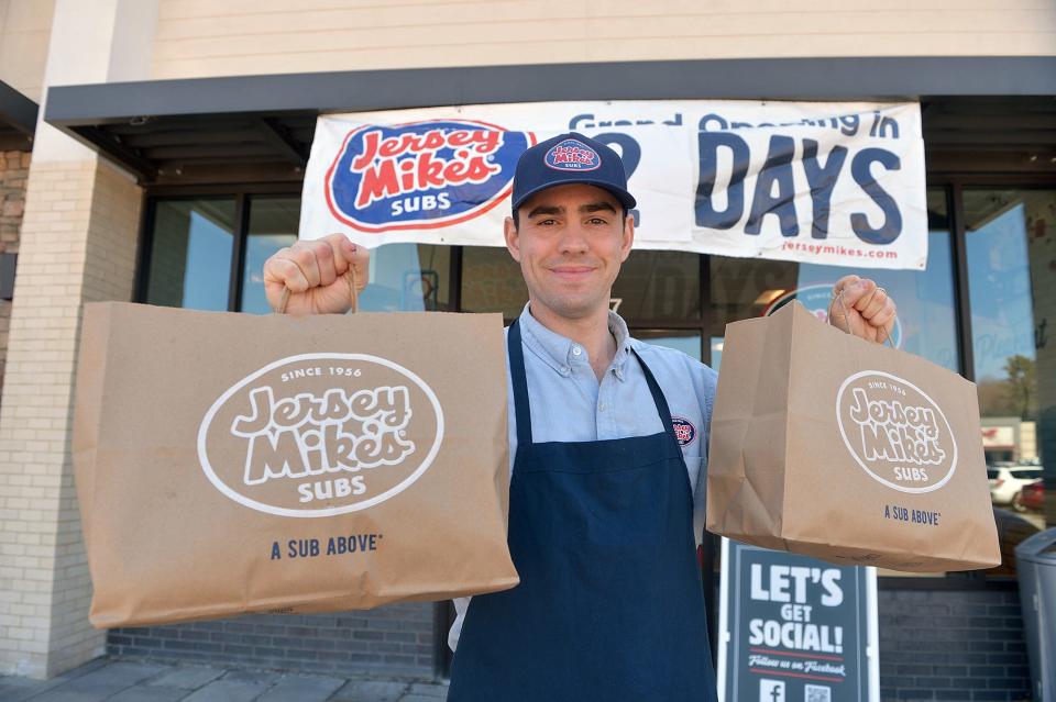 Brian O'Loughlin, franchise co-owner of Jersey Mike's, is ready for Wednesday's opening of the sandwich chain's newest shop at the Milford Crossing shopping center at 128 Medway Road (Route 109), April 4, 2022.