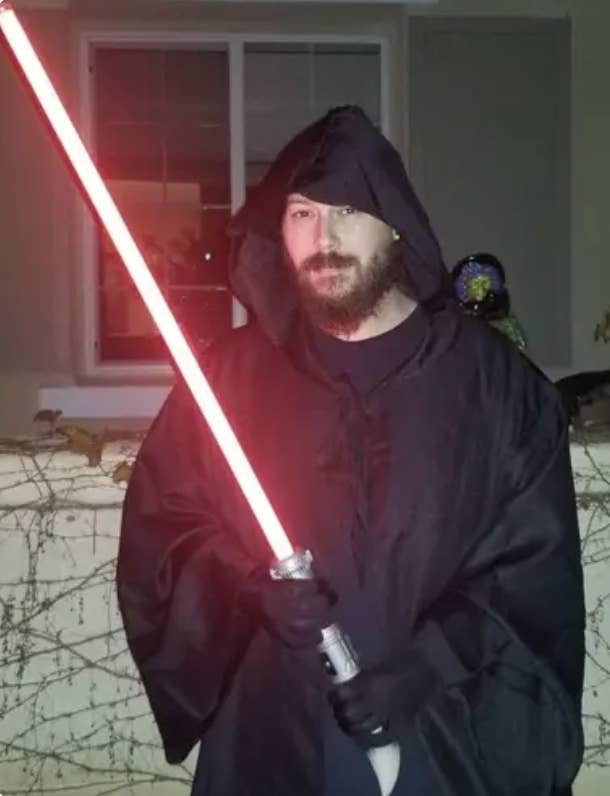 A man dressed in a Star Wars–themed costume