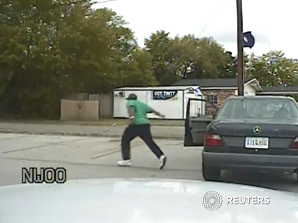 A still image taken from police dash cam video allegedly shows Walter Scott running from his vehicle during a traffic stop before he was shot and killed by white police officer Michael Slager in North Charleston, South Carolina.&nbsp; (Photo: Handout . / Reuters)