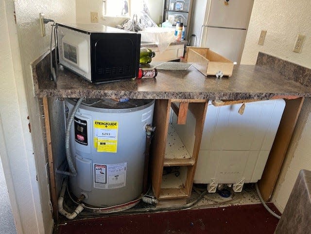 Ventura City Fire officials say an explosion in a residential kitchen Thursday was caused by pest control foggers placed too close to a water heater.