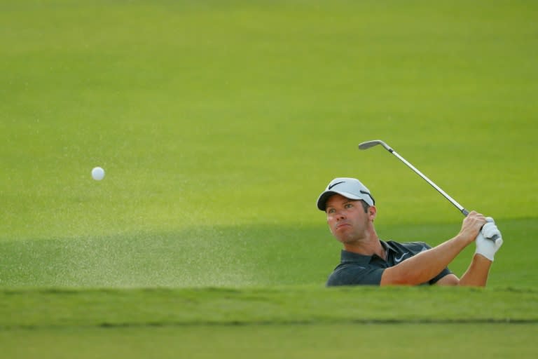 Paul Casey of England plays a shot from a bunker on the 18th hole during the third round of the TOUR Championship, at East Lake Golf Club in Atlanta, Georgia, on September 23, 2017