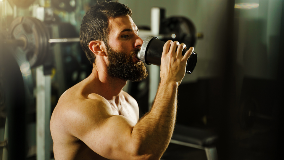 Man drinking creatine