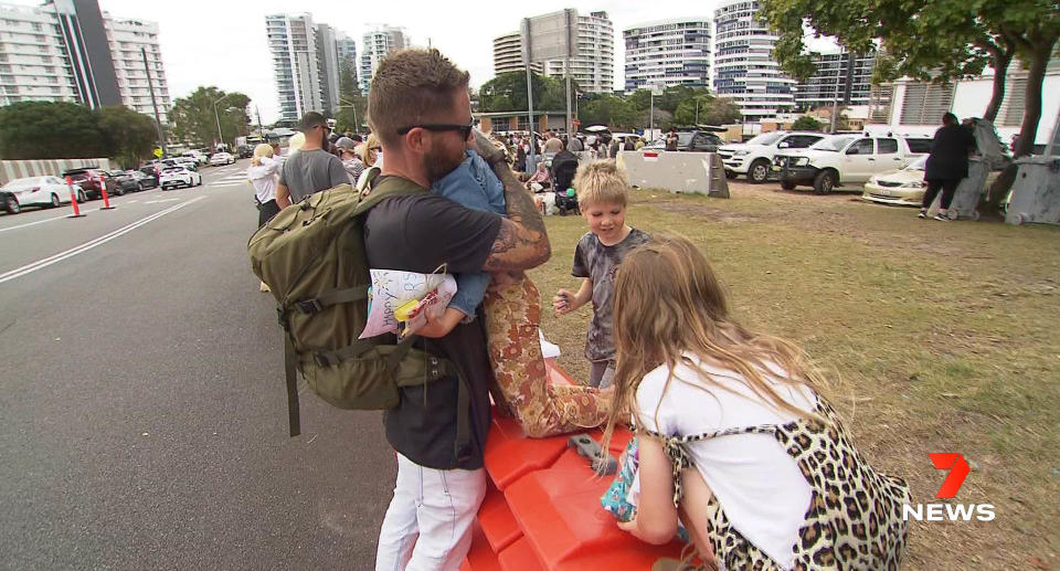 Images showing families gathering at the border between Queensland and New South Wales to celebrate Father’s Day have been slammed as “insane”. Source: 7News Australia 