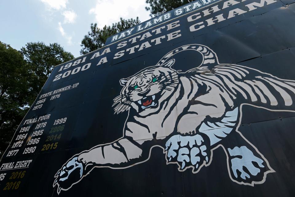 The Commerce scoreboard shows the history and success of the Tigers' football program.