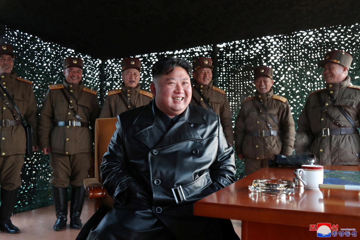 North Korean leader Kim Jong Un smiles after witnessing the firing of what was believed to be two short-range ballistic missiles on Saturday. (Photo: KCNA KCNA/Reuters)