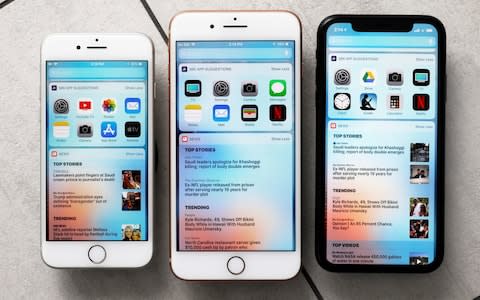 This photo compares the iPhone 8 (left), iPhone 8 Plus (centre) and iPhone XR (right) - Credit: AP Photo/Richard Drew