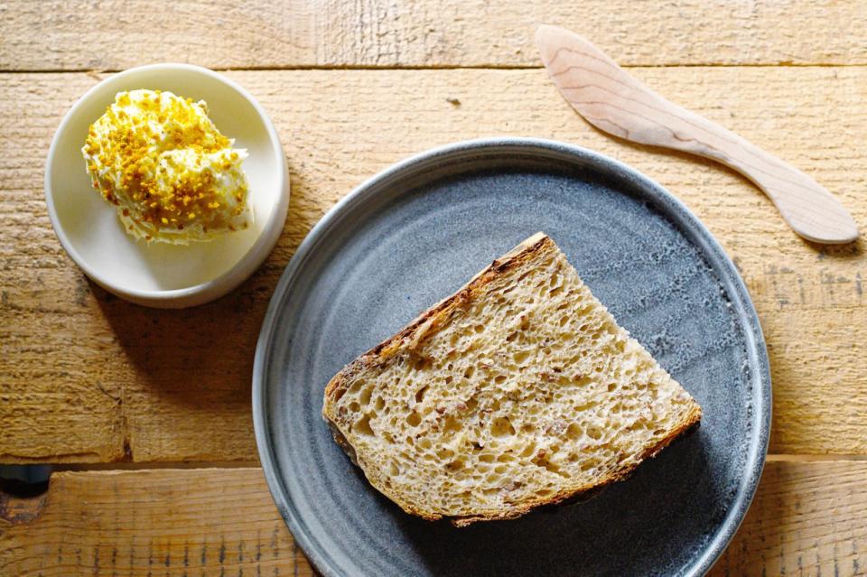 Picard's bread, served with butter and bee pollen.