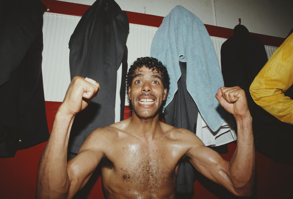 Leeds United player Chris Kamara celebrates in the dressing room after Leeds United had gained promotion to the 1st Division, after a Division two match at Dean Court between AFC Bournemouth and Leeds United on May 5, 1990 in Bournemouth, England. (Photo Radders/ Allsport/Getty Images)