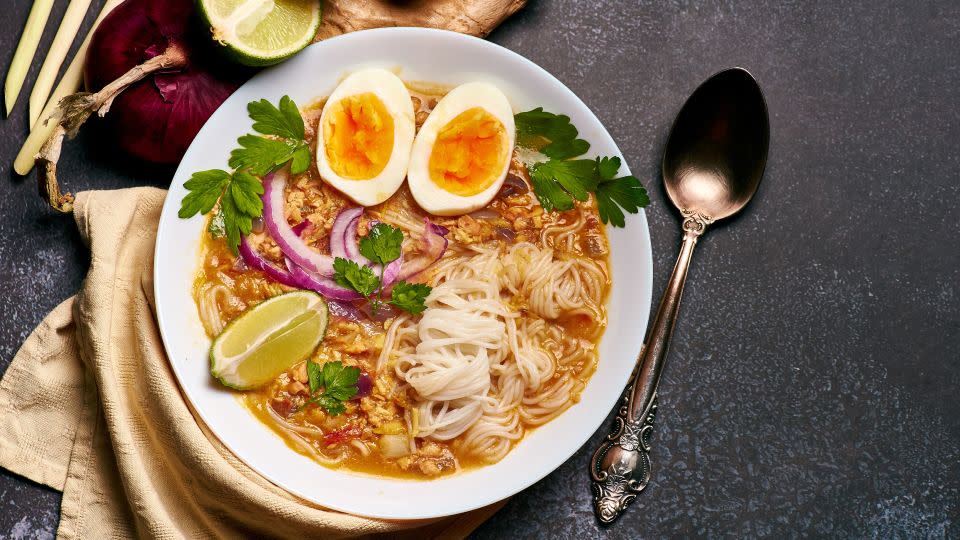 This version of mohinga features catfish, rice noodles, chicken eggs and lime.  - Shutterstock