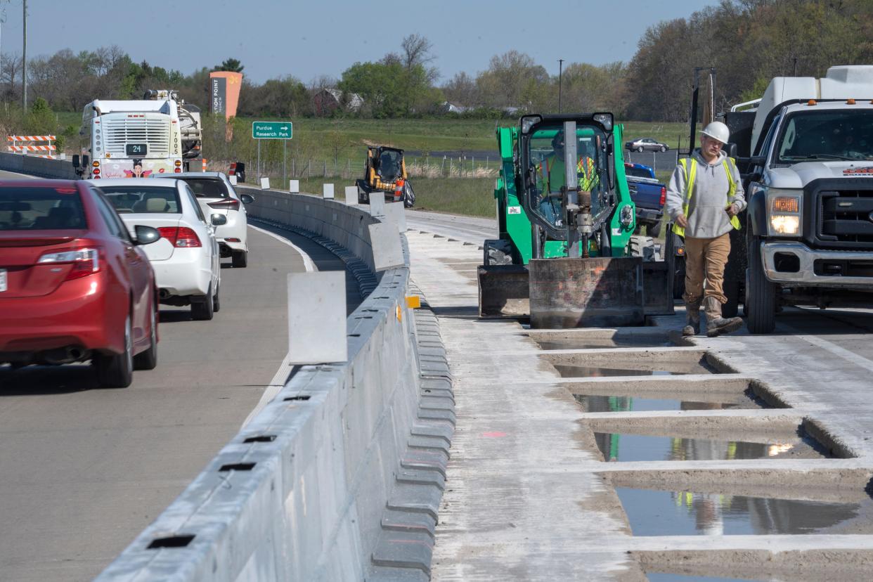 Work has started on a pilot project that will produce an electric charging highway seqment Monday, April 22, 2024 in West Lafayette. Purdue University, Cummins Inc. and INDOT are partnering to build this first-of-its-kind, in the United States, EV charging highway segment that will be able to charge heavy duty and passenger electric vehicles as they travel over the road. This project is in one lane over a quarter-mile stretch on U.S. 231/U.S. 52 between Cumberland Avenue and Lindberg Road, near INDOT’s West Lafayette Subdistrict office.