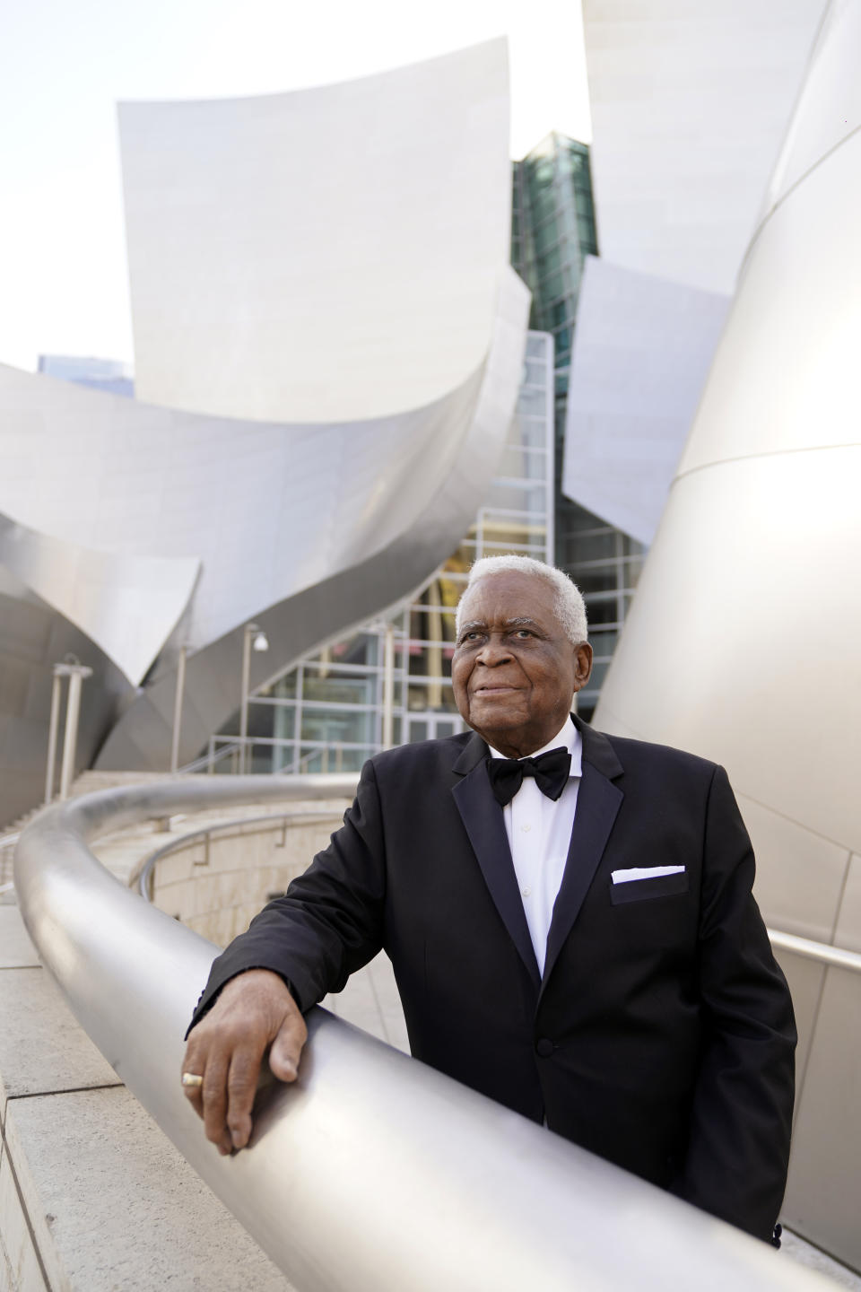 Horace Bowers, 93, owner of Bowers & Sons Cleaners in Los Angeles and a subject of the Oscar-nominated documentary short film "A Concerto is a Conversation," poses for a portrait outside Walt Disney Concert Hall, Thursday, April 15, 2021, in Los Angeles. (AP Photo/Chris Pizzello)