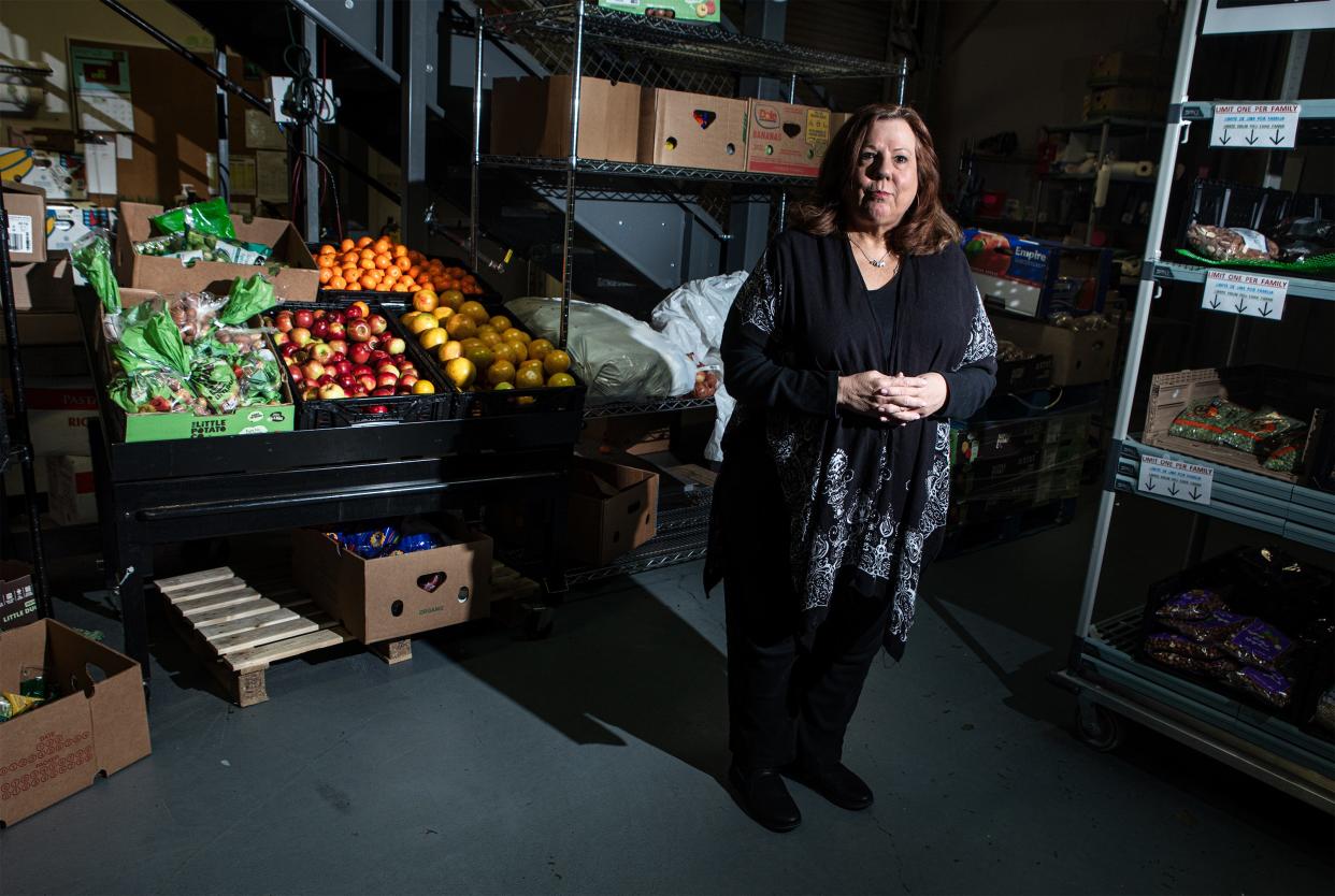 Diane Serratore, CEO of People to People, the non-profit feeding Rockland's hungry, stands in the group's food pantry in Nanuet, where those facing chronic food insecurity can choose fresh produce and staples.