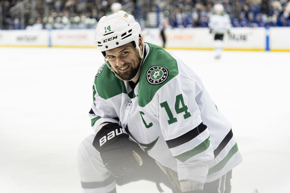 Dallas Stars left wing Jamie Benn (14) rests during a break in action in the third period of an NHL hockey game against the New York Rangers on Tuesday, Feb. 20, 2024 in New York. (AP Photo/Peter K. Afriyie)