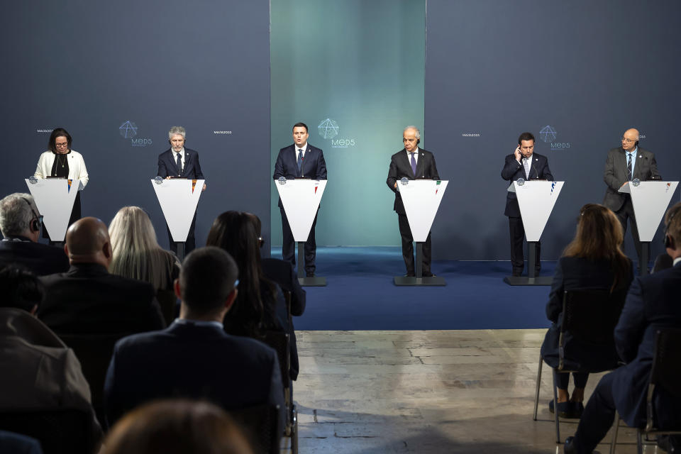 From left, Sweden's Ministry of Justice Maria Malmer Stenergard, Spain's Interior Minister Fernando Grande-Marlaska, Minister for Home Affairs and Security of Malta Byron Camilleri, Italy's Interior Minister Matteo Piantedosi, Greece's Minister of Migration Notis Mitarachi, and Ministry of Interior of the Republic of Cyprus Costas Constantinou hold a press conference at the MED 5 conference held in Valletta, Malta, Saturday, March 4, 2023. (AP Photo/Rene Rossignaud)