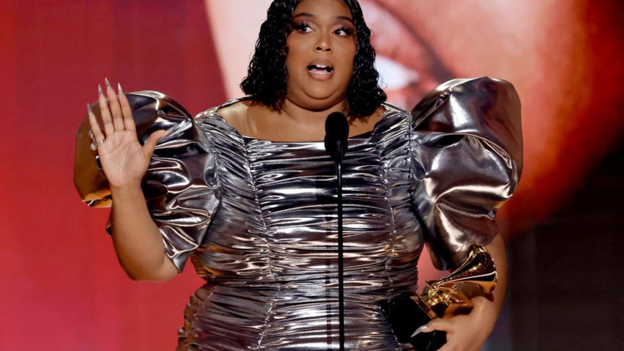 <div>LOS ANGELES, CALIFORNIA - FEBRUARY 05: Lizzo accepts the Record Of The Year award for "About Damn Time" onstage during the 65th GRAMMY Awards at Crypto.com Arena on February 05, 2023 in Los Angeles, California. (Photo by Kevin Winter/Getty Images for The Recording Academy)</div>