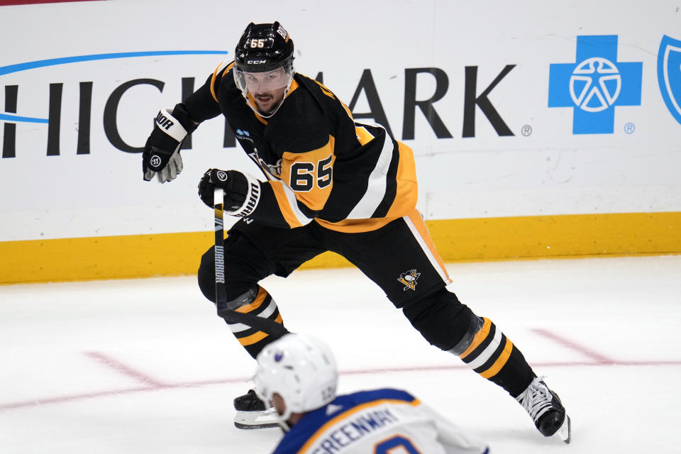 Pittsburgh Penguins' Erik Karlsson (65) skates during the first period of an NHL hockey preseason game against the Buffalo Sabres in Pittsburgh, Thursday, Sept. 28, 2023. (AP Photo/Gene J. Puskar)
