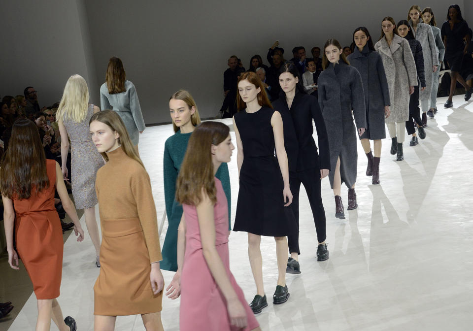 A model wears a creation for Jil Sander women's Fall-Winter 2014-15 collection, part of the Milan Fashion Week, unveiled in Milan, Italy, Friday, Feb.21, 2014. (AP Photo/Giuseppe Aresu)