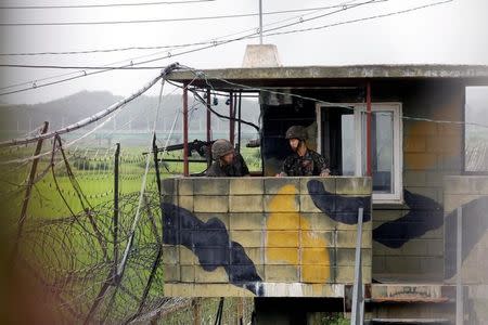 South Korean soldiers stand guard at a guard post near the demilitarised zone separating the two Koreas in Paju, South Korea, August 10, 2017. REUTERS/Kim Hong-Ji