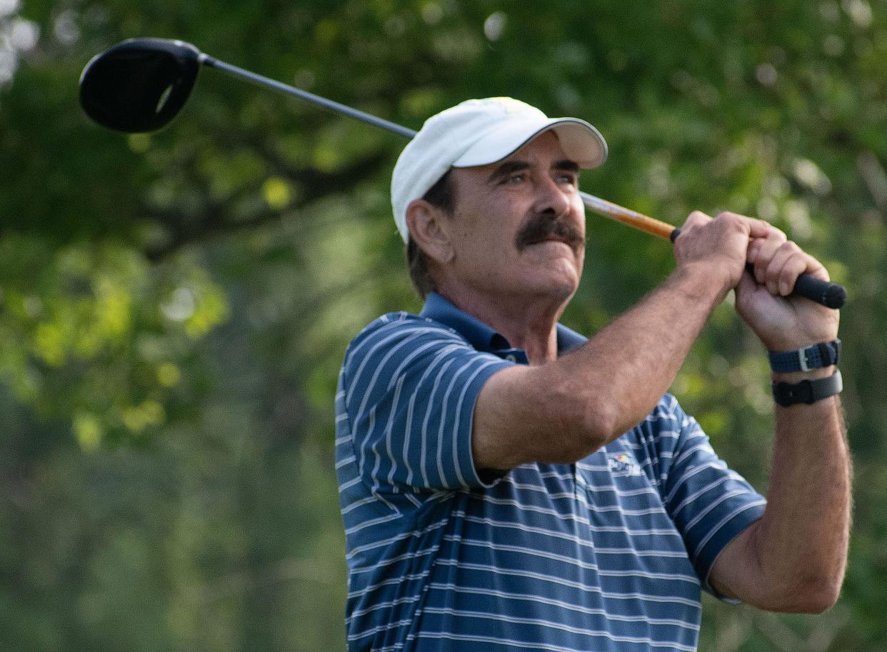 Rory Brown tees off the second hole at Cascades Golf Course in the Bloomington City Golf Tournament on July 9, 2023.