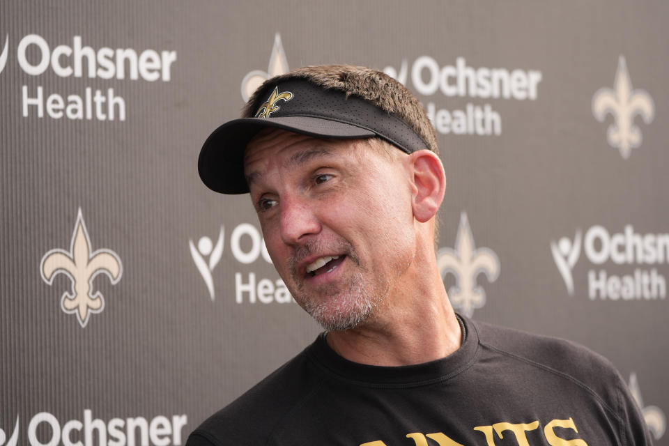 New Orleans Saints head coach Dennis Allen talks to reporters after an NFL rookie minicamp football practice in Metairie, La., Saturday, May 11, 2024. (AP Photo/Gerald Herbert)