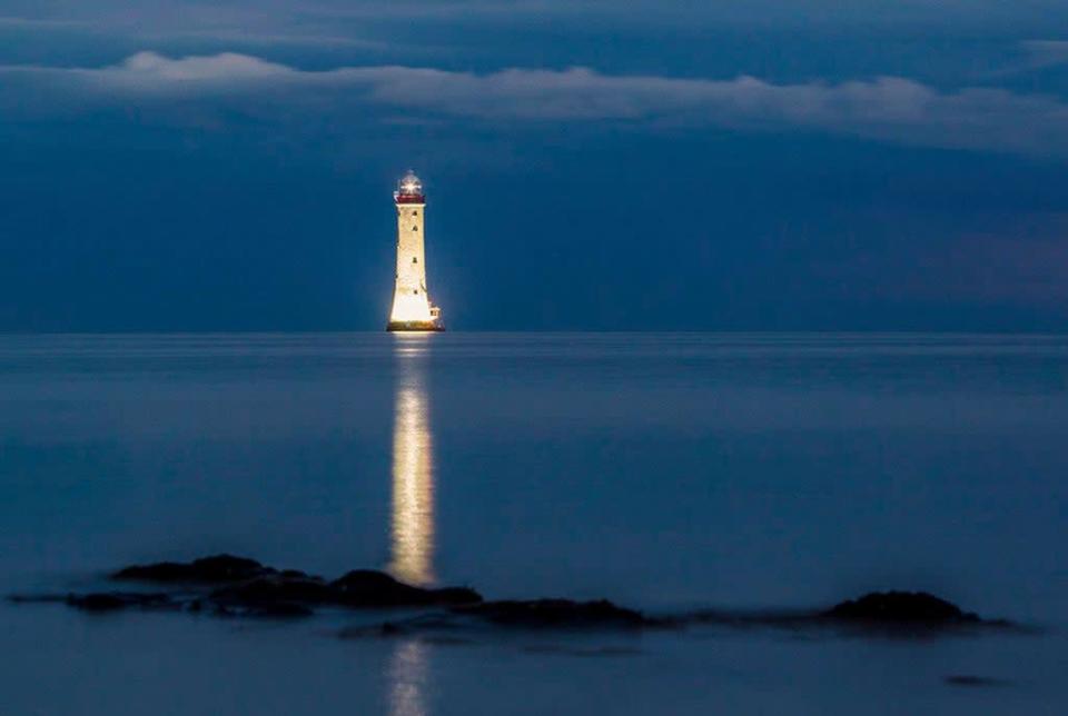 The Haulbowline Lighthouse which sits near the border of Northern Ireland and the Republic at Carlingford Lough (Carlingford Lough Ferry/PA) (PA Media)