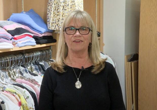 Gail Decker, owner of Gail's Clothing Company, has rebranded her clothing company after 24 years in business, following a legal battle with a huge U.K. clothing company with the same name. (Jeremy Eaton/CBC - image credit)