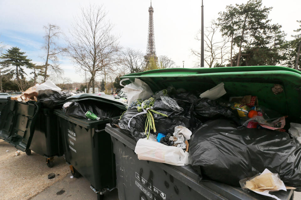 Garbage bags have been piling up since waste collectors went on strike against the French government's proposed pensions reform, in front of the Eiffel Tower in Paris, on March 17, 2023. 