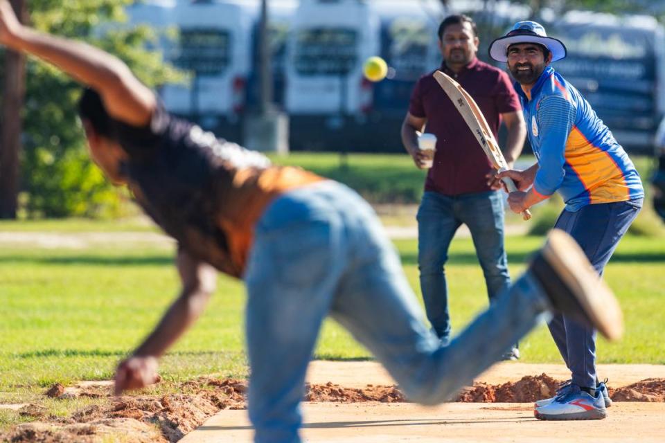 The Lexington Lions’ Sathish Reddy Thula bowls to G.V. Ramana during practice on Saturday, July 6, 2024. While practices can be more casual, the team plays across the region against other cricket teams.