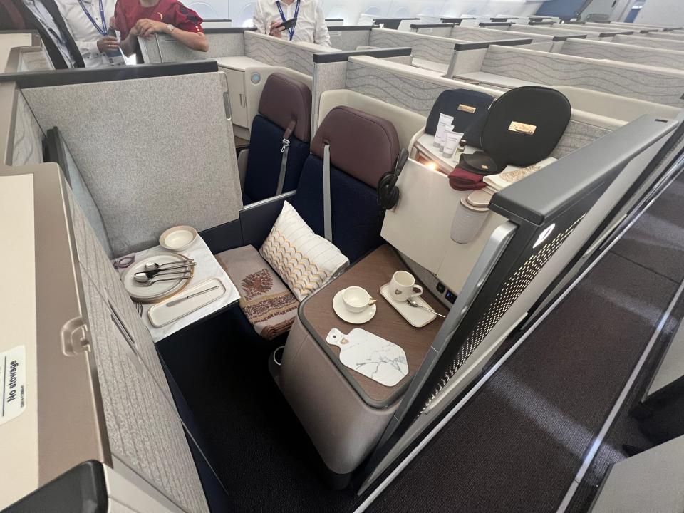 A wide shot of a business class seat on an Air India Airbus A350 at the 2024 Farnborough Airshow