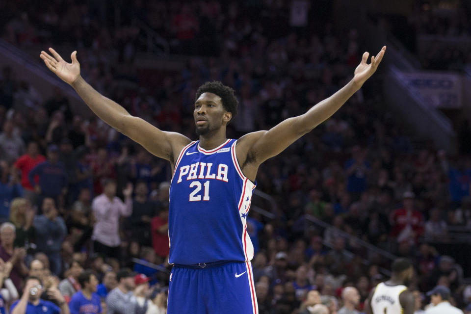 Joel Embiid fires up the crowd. (Getty)