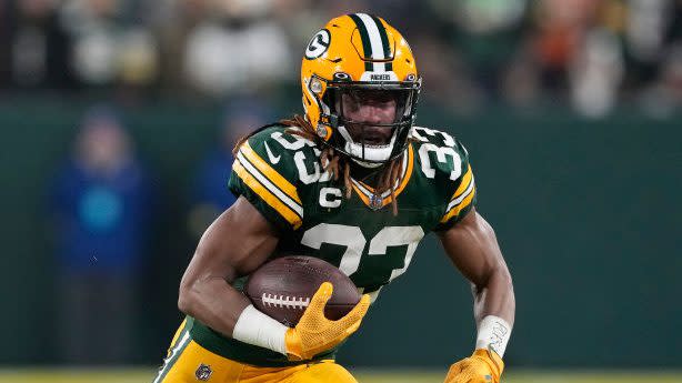 Aaron Jones glad to be back with Green Bay Packers, has