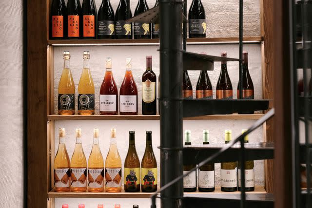 <p>Courtesy of Ikigai Market</p> A selection of sake and wines at Ikigai, a boutique Japanese market owned by one of Greeceâ€™s most beloved chefs, Ari VezenÃ©