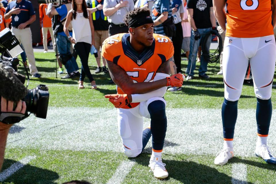 <p>Denver Broncos inside linebacker Brandon Marshall (54) kneels during the National Anthem prior to the game against the Indianapolis Colts at Sports Authority Field at Mile High. Mandatory Credit: Isaiah J. Downing-USA TODAY Sports </p>