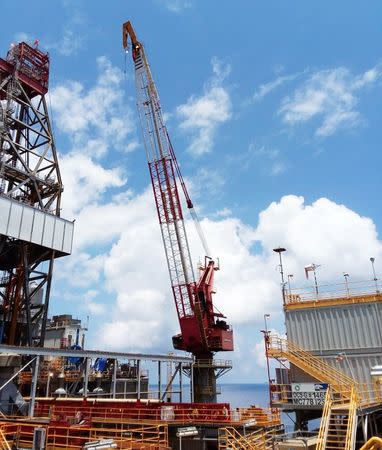 Cranes used to lift and move heavy drilling equipment are pictured on BP's Thunder Horse Oil Platform in the Gulf of Mexico, 150 miles from the Louisiana coast, May 11, 2017. Picture taken May 11, 2017. REUTERS/Jessica Resnick-Ault