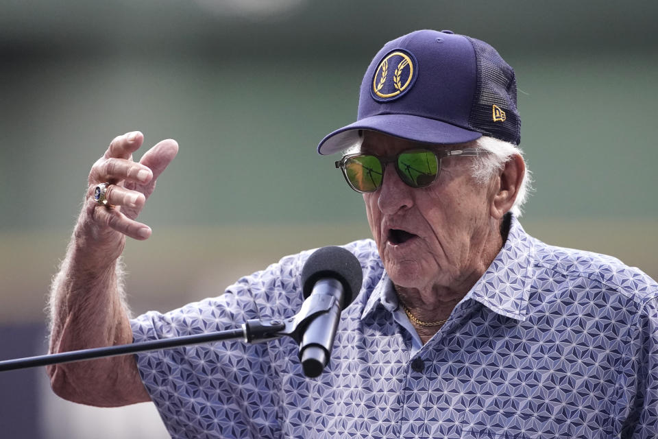 Broadcaster Bob Uecker speaks before a baseball game between the Milwaukee Brewers and the Cincinnati Reds on Friday, Aug. 5, 2022, in Milwaukee. (AP Photo/Aaron Gash)