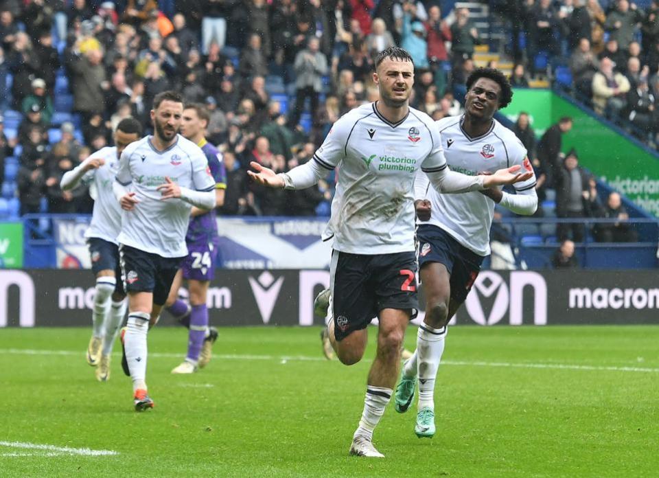 The Bolton News: Aaron Collins celebrates a goal in the 5-2 win against Reading