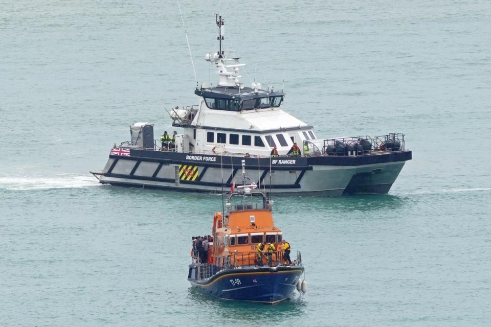 A Border Force vessel and an RNLI lifeboat were dispatched from Dover (PA Wire)