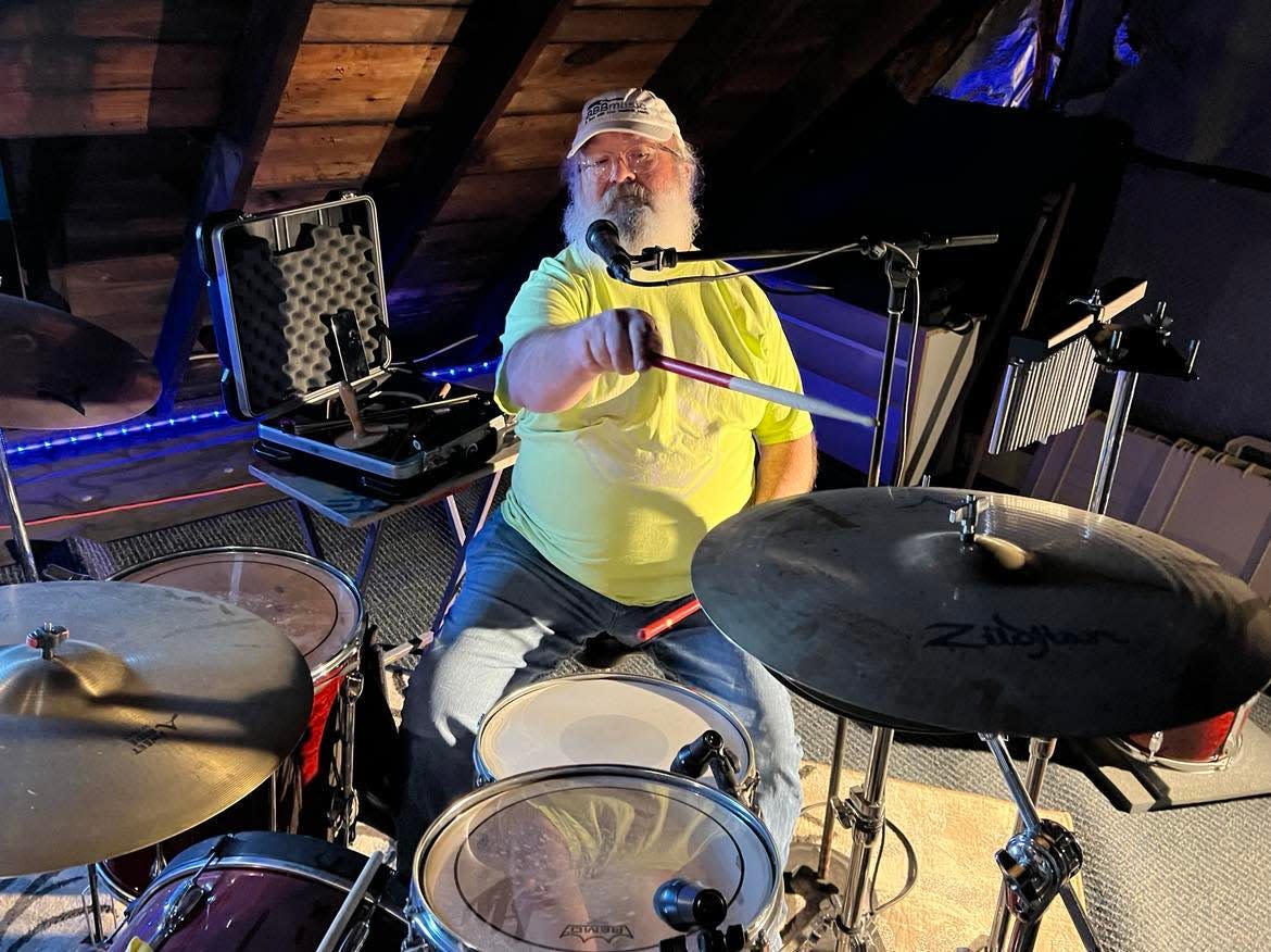 Tim "Patch" Issac of Massillon rehearses with members of Aaron Hymes Band. Hymes, a Stark County resident, is an an award-winning Christian country music artist.