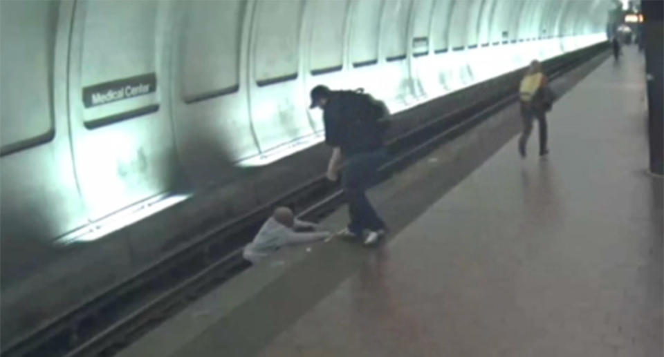 A blind man made a narrow escape after falling onto train tracks moments before a train approached. Source: CBS/ DC METRO