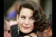 Liv looks glamorous in an old-Hollywood hairstyle at the 76th Annual Academy Awards in 2004.