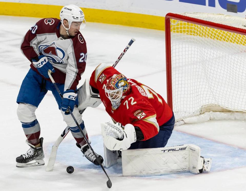 Florida Panthers goaltender Sergei Bobrovsky (72) blocks a shot by Colorado Avalanche center Ross Colton (20) in the first period of their NHL game at the Amerant Bank Arena on Saturday, Feb. 10, 2024, in Sunrise, Fla.