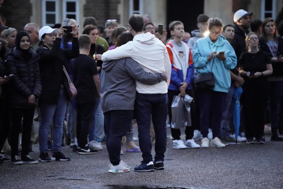 Mourners gather outside Windsor Castle in Berkshire following the announcement of the death of Queen Elizabeth II. (Andrew Matthews/PA) (PA Wire)