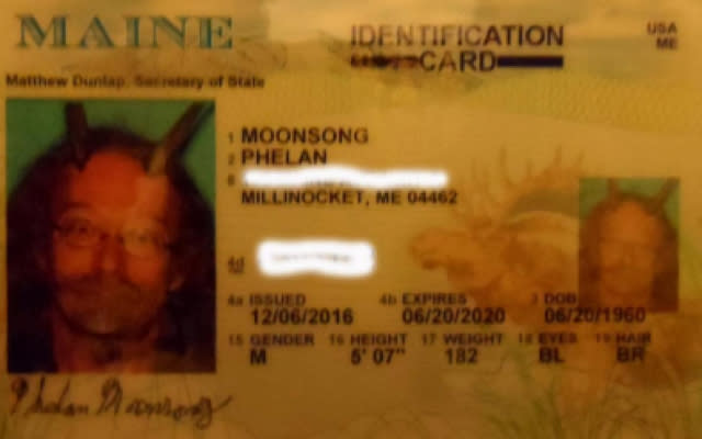 Pagan priest fights to wear religious horns on head in state ID photo and wins